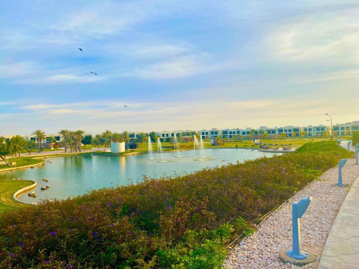 Retaj Salwa Resort & Spa Doha Exterior foto View of the lake at Al-Shaqra