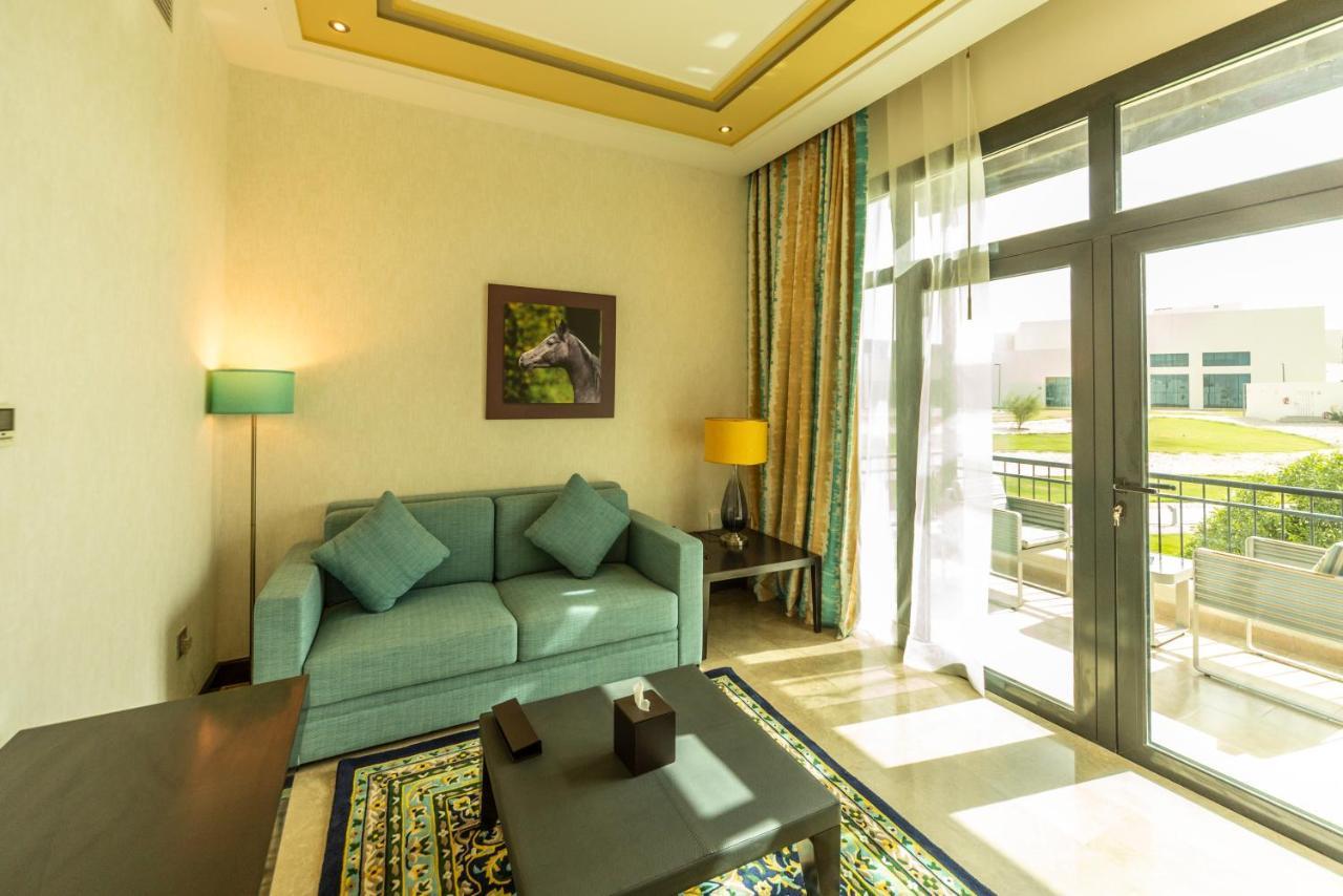 Retaj Salwa Resort & Spa Doha Exterior foto A living room at the resort